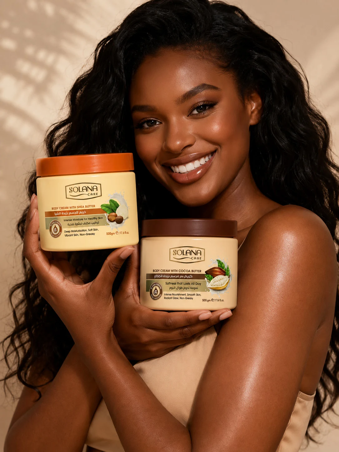 Woman holding Solana Care shea-butter and cocoa-butter body creams